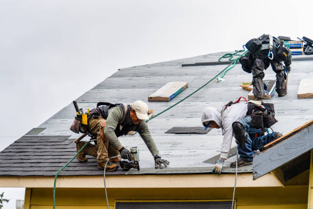 Professional Storm Damage Roof Repair technician working in Cortlandt Manor, NY